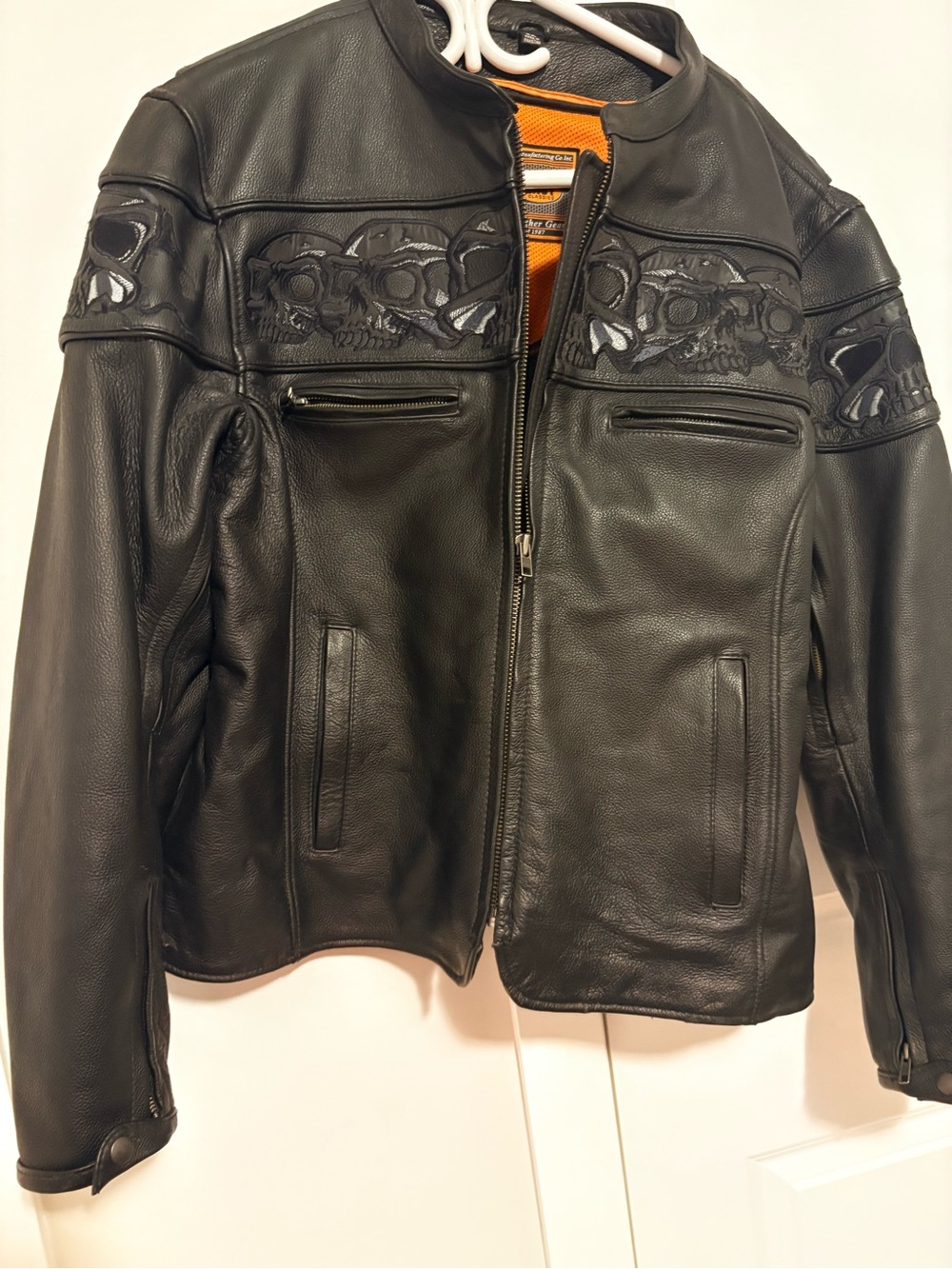 Ladies Black Leather Jacket with Skull Embossed Detailing
